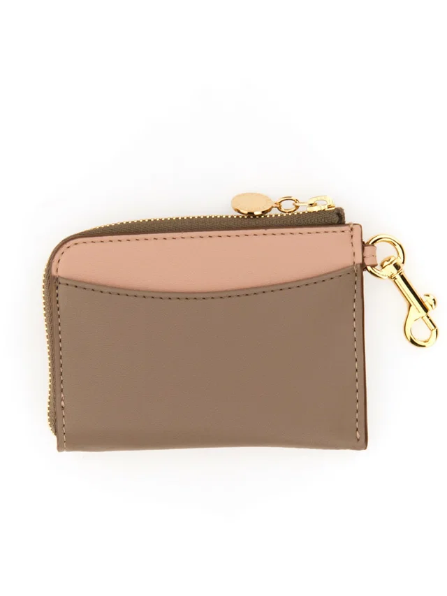 Stella McCartney Perforated Logo Wallet — Powder Polyurethane & Purses from HEWI