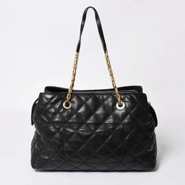 Chanel Chain Tote Bag CC Logo Quilted Leather Black Gold in Black Leather from The Reluxe, photo 2 of 2