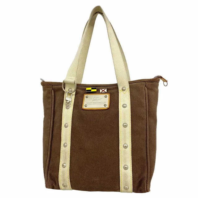 Louis Vuitton Tote Antigua Cabas MM Brown in Brown from The Reluxe