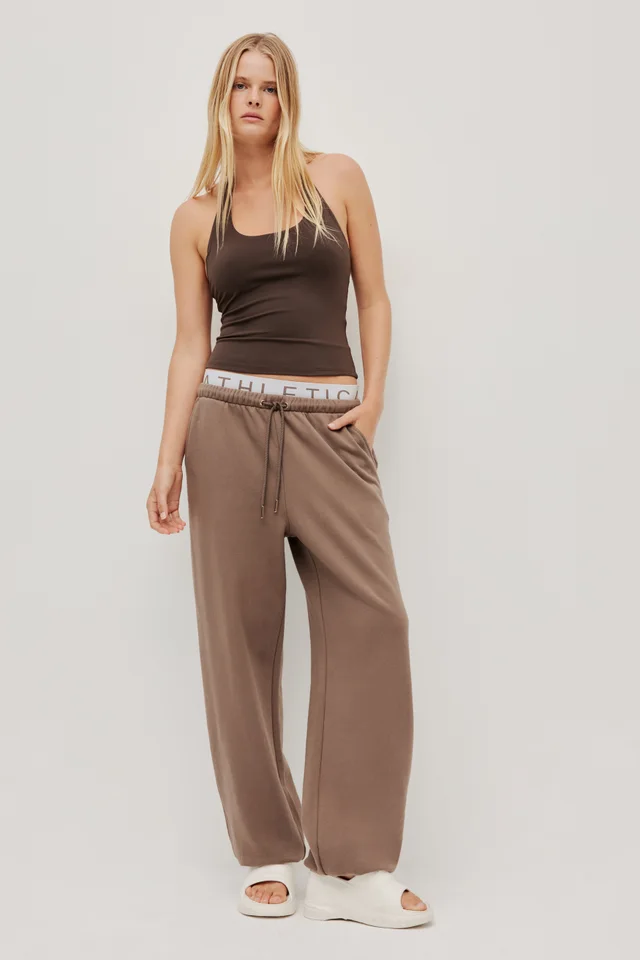 Athletica Cuffed Hem Logo Track Pants from Aje, photo 1 of 1