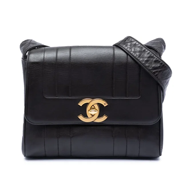Black Chanel CC Vertical Quilt Lambskin Flap Crossbody Bag in Black Lambskin from Designer Revival