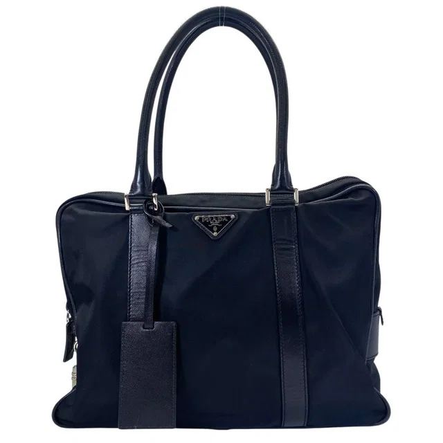 Prada Briefcase Business Nylon Saffiano Leather Triangle Logo Nero Black in Black Saffiano leather from The Reluxe