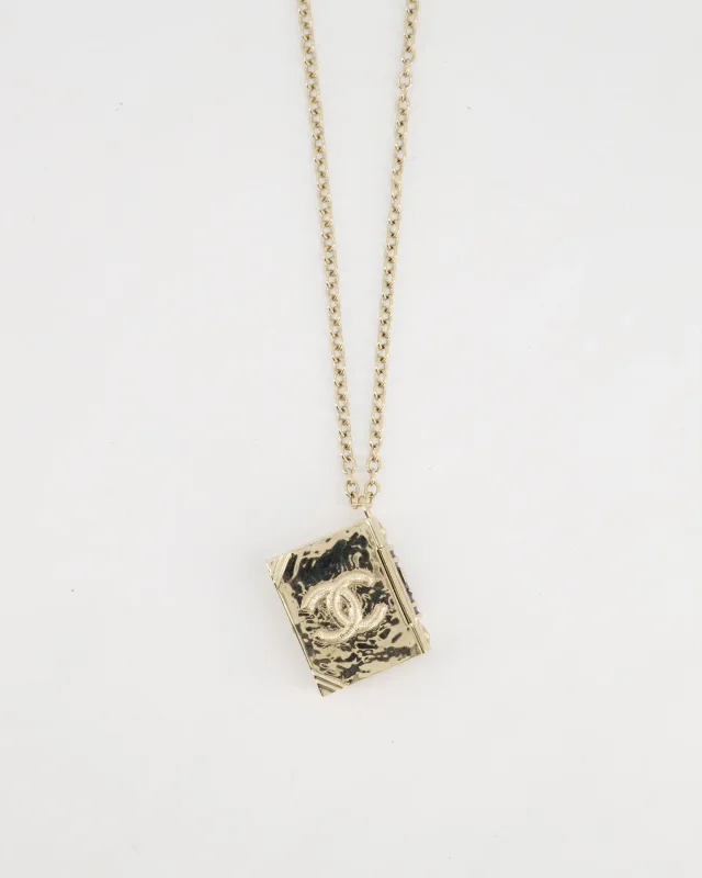 Chanel Champagne Gold, Star Lion and CC Logo Book Pendant Necklace in Gold from Sellier, photo 3 of 7