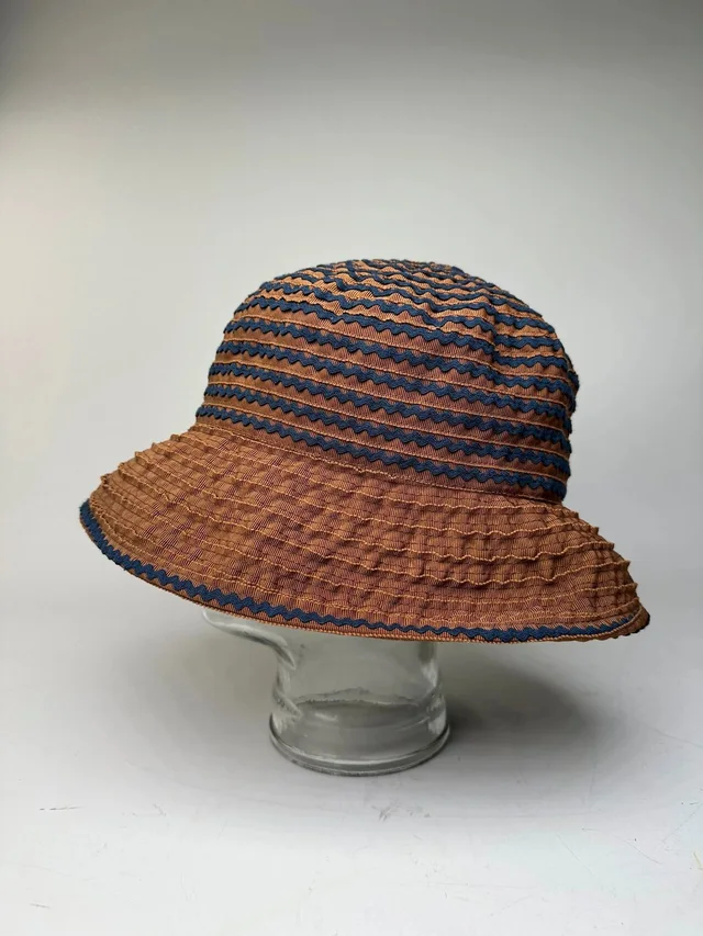 Givenchy Vintage Woven Bucket Hat Rust Navy in red Woven leather from Grailed
