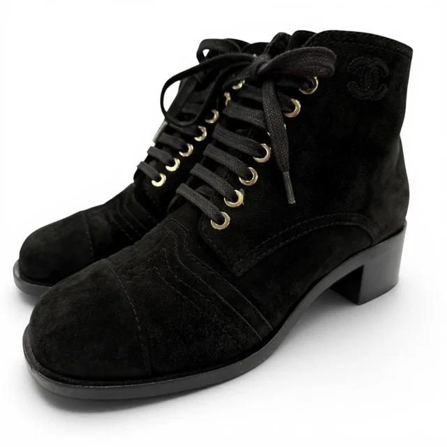 Chanel CC Logo Embroidery Shearling Boots Ankle Black in Black from The Reluxe