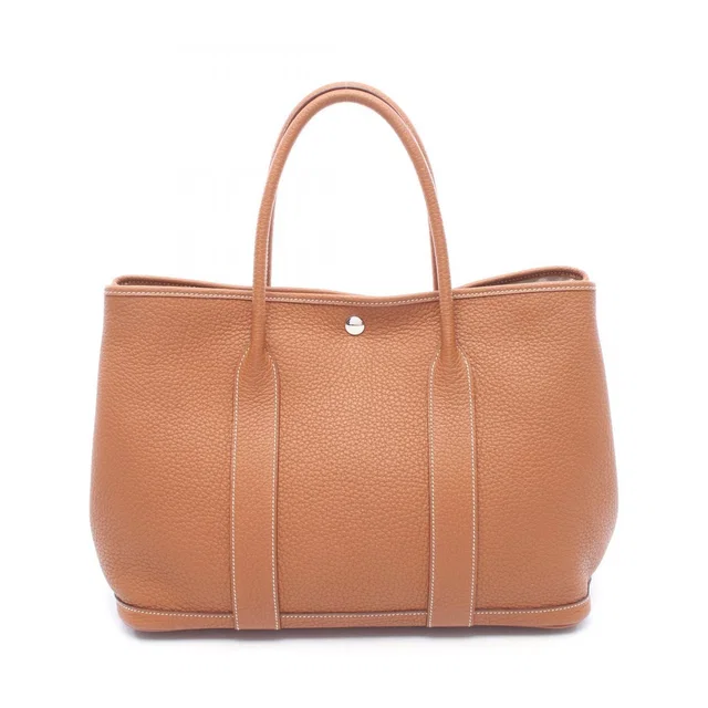 Hermès Tote Bag Garden Party PM Gold Leather in Gold Leather from The Reluxe