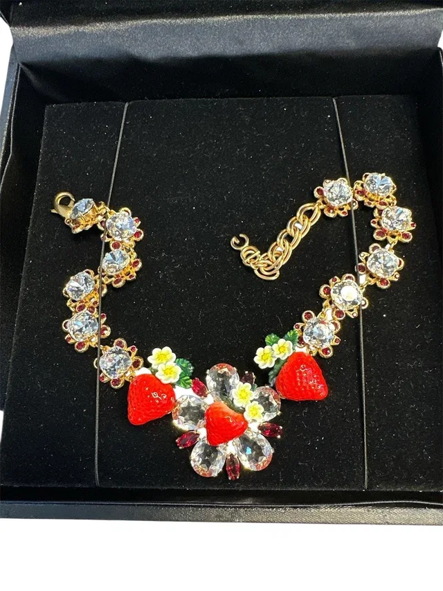 Dolce & Gabbana Gold Crystal Strawberry Necklace in Gold from Luxury Promise