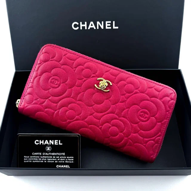Chanel Wallet Camellia Embossed Caviar Zip in Caviar leather from The Reluxe