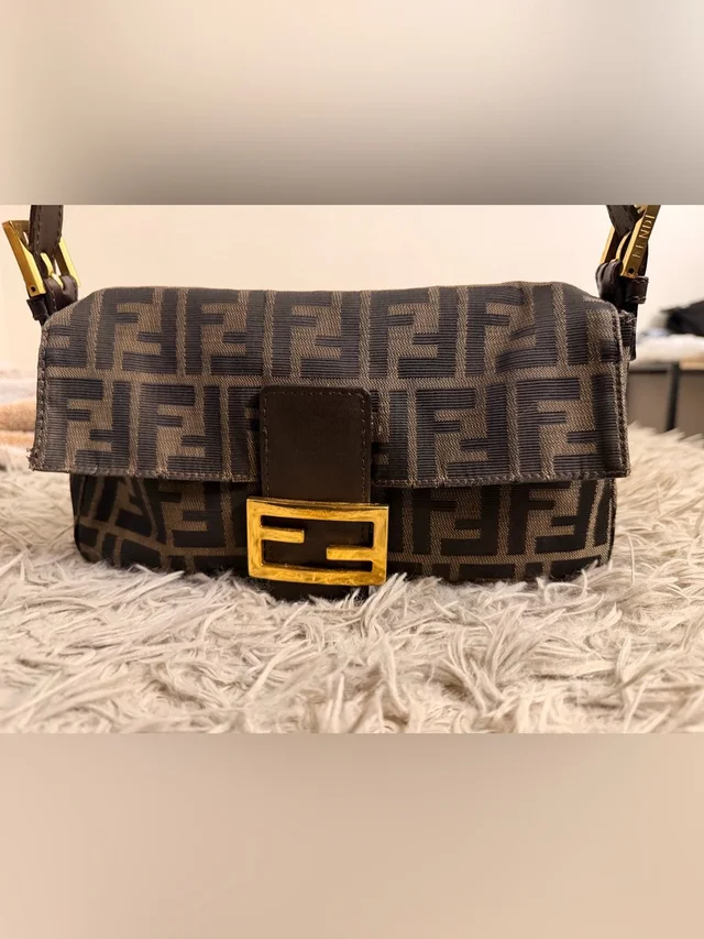 Fendi Vintage Zucca Baguette in gold|brown|red Calfskin from Poshmark, photo 1 of 1