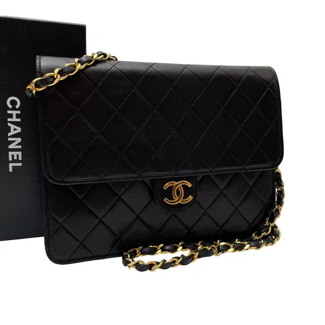 Chanel Quilted Lambskin CC Logo Chain Shoulder Bag in Lambskin from The Reluxe