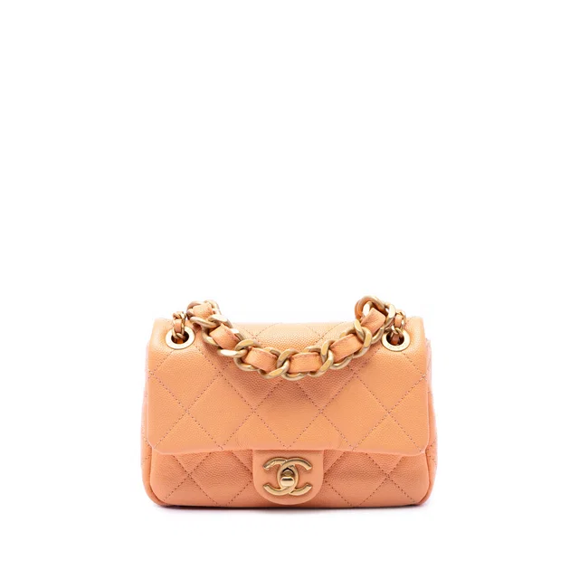 Orange Chanel Mini CC Quilted Caviar Single Flap Crossbody Bag in Orange Caviar leather from Designer Revival