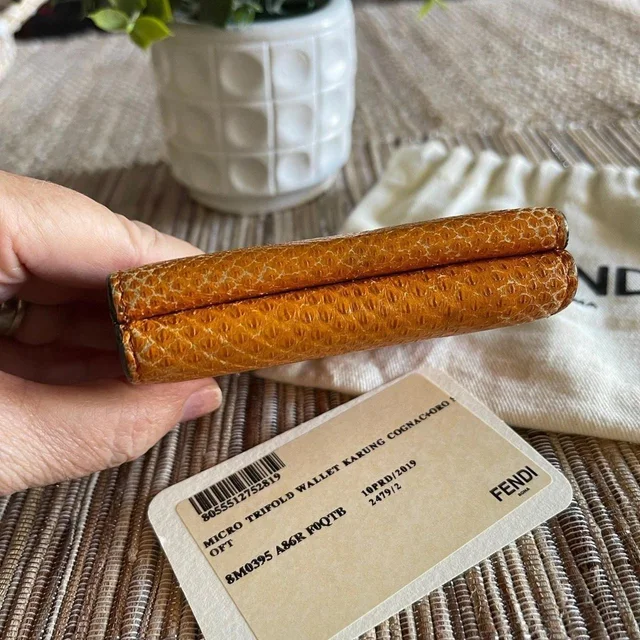 Fendi Women's Wallet - Orange in orange from Depop, photo 7 of 9