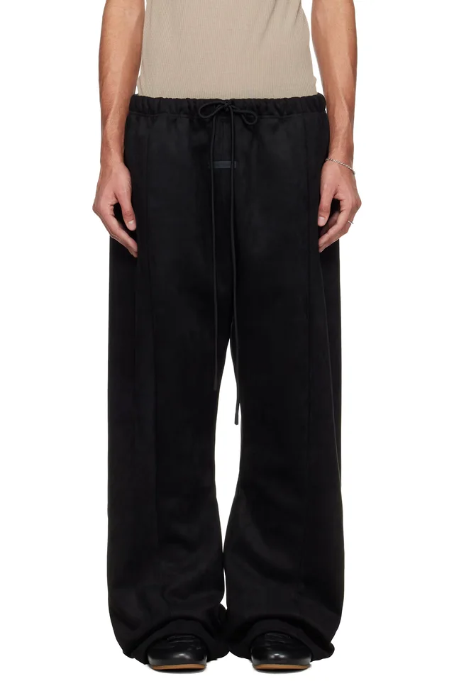 Fear of God ESSENTIALS Black Holiday Flare Faux-Suede Sweatpants from SSENSE, photo 1 of 1