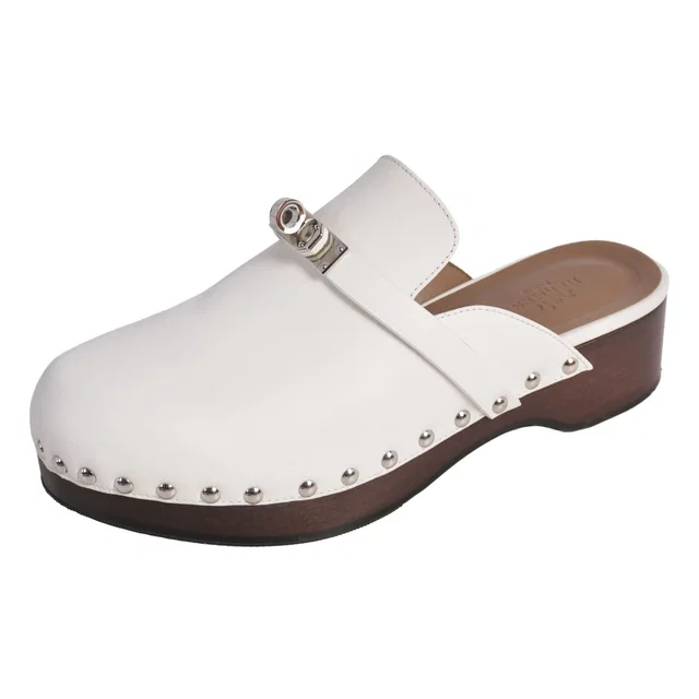 Hermès Sandals Carlotta Clogs Kelly in Leather from The Reluxe
