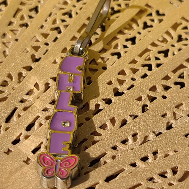 Chloé Purple Key Chain With Pink Butterfly in pink|purple from Poshmark