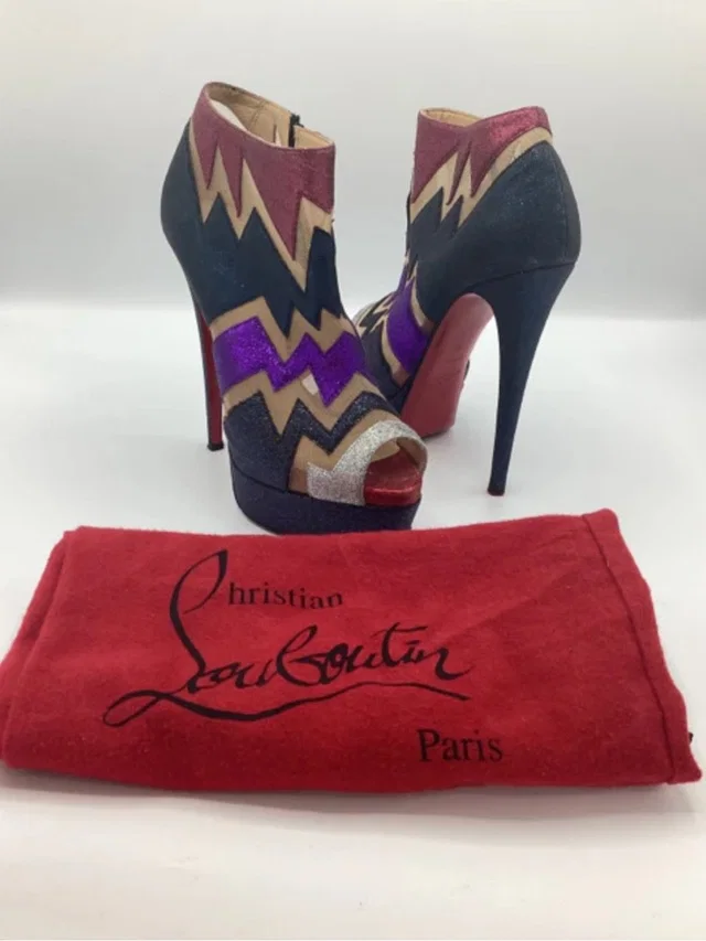 Christian Louboutin Sz 36 Ziggy Ankle Boot Shoe in black|red from Poshmark