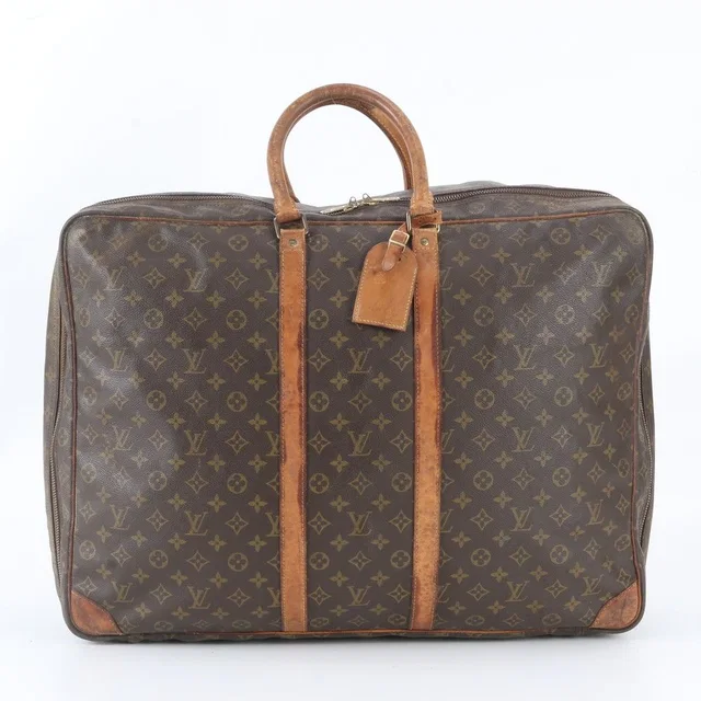 Louis Vuitton Monogram Sirius 60 Leather Boston Bag Tote Carry in Leather from The Reluxe