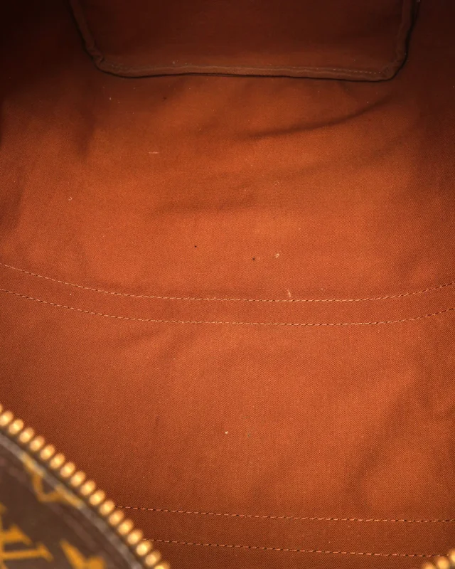 Louis Vuitton Monogram Keepall 60 Weekend Bag in Coated canvas from A Retro Tale, photo 11 of 13