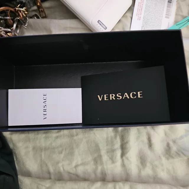 Versace Women's Sunglasses - Black/White in white|black from Depop, photo 1 of 1