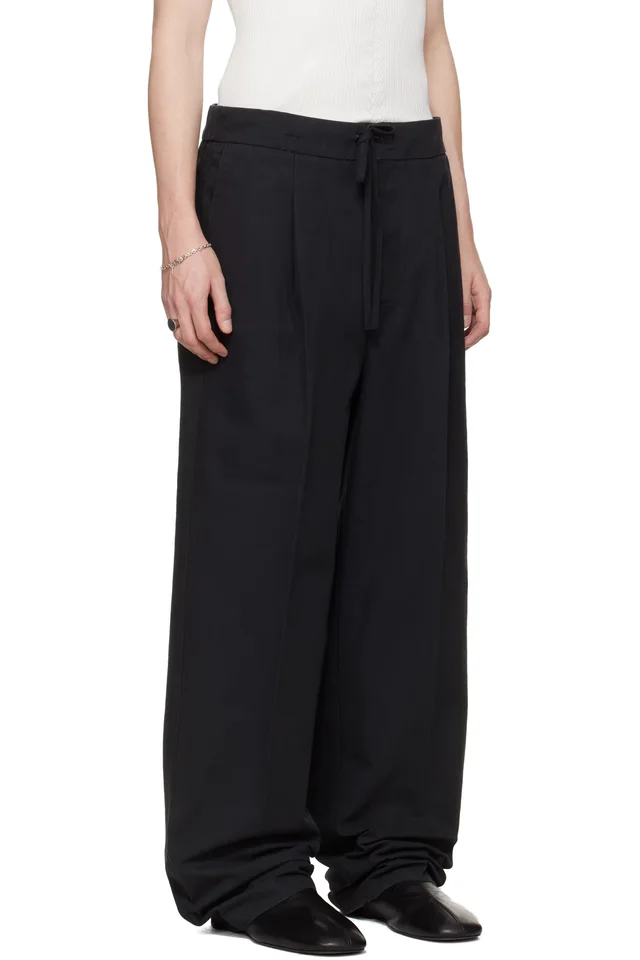 Fear of God ESSENTIALS Black Pleat Front Trousers, photo 2 of 4 from SSENSE