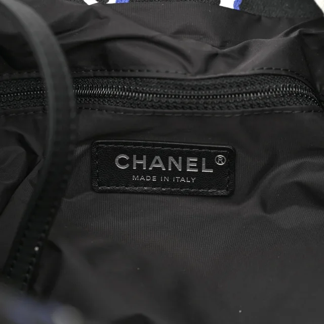 Chanel Printed Airline Drawstring Bag Black Blue in Black Canvas from FASHIONPHILE, photo 6 of 12