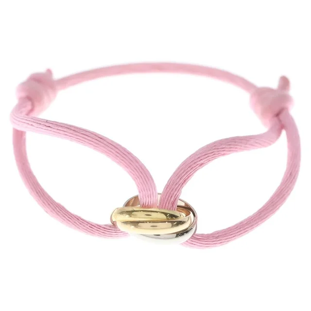 Cartier Baby Trinity Code Bracelet Pink Yellow Gold in Pink from The Reluxe
