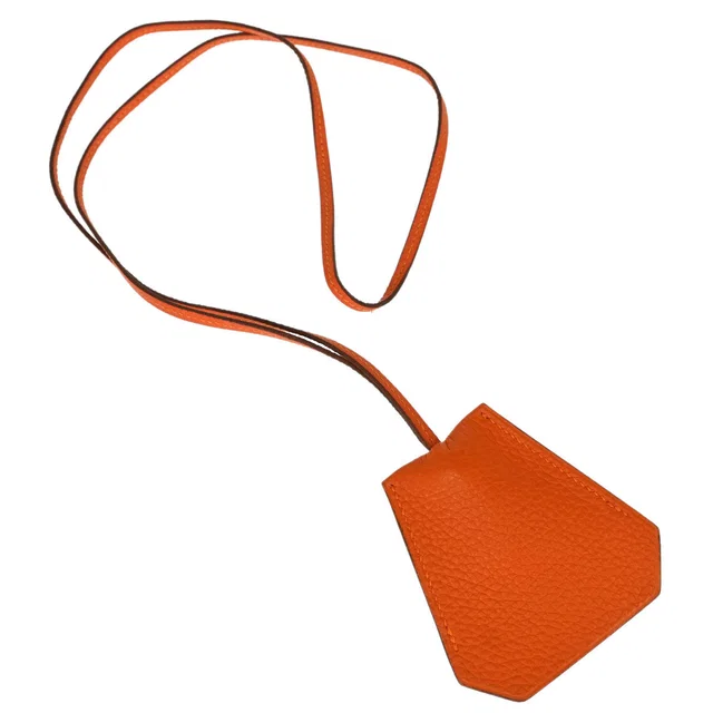 Hermès by Margiela Orange Taurillon Clochette Necklace Pendant in Orange Clemence leather from AMORE Vintage Tokyo