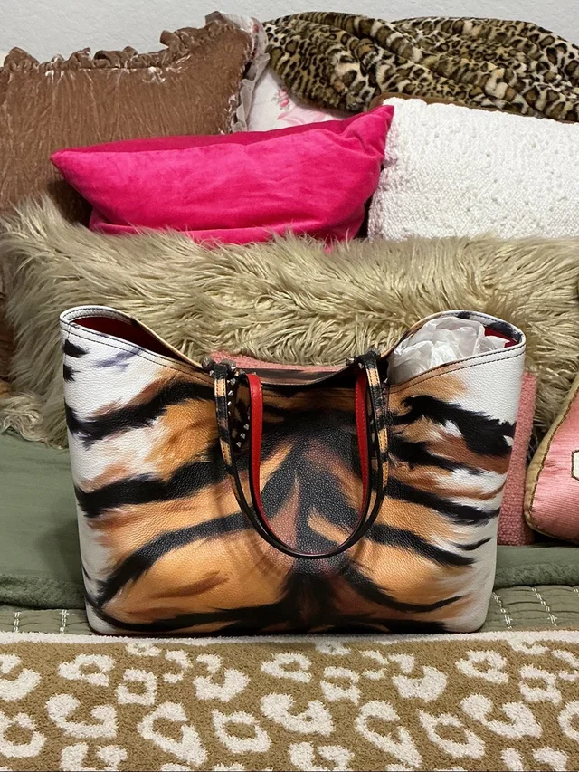 Christian Louboutin Tiger-Print Tote In Brown, Black And Cream in red|black Leather from Poshmark