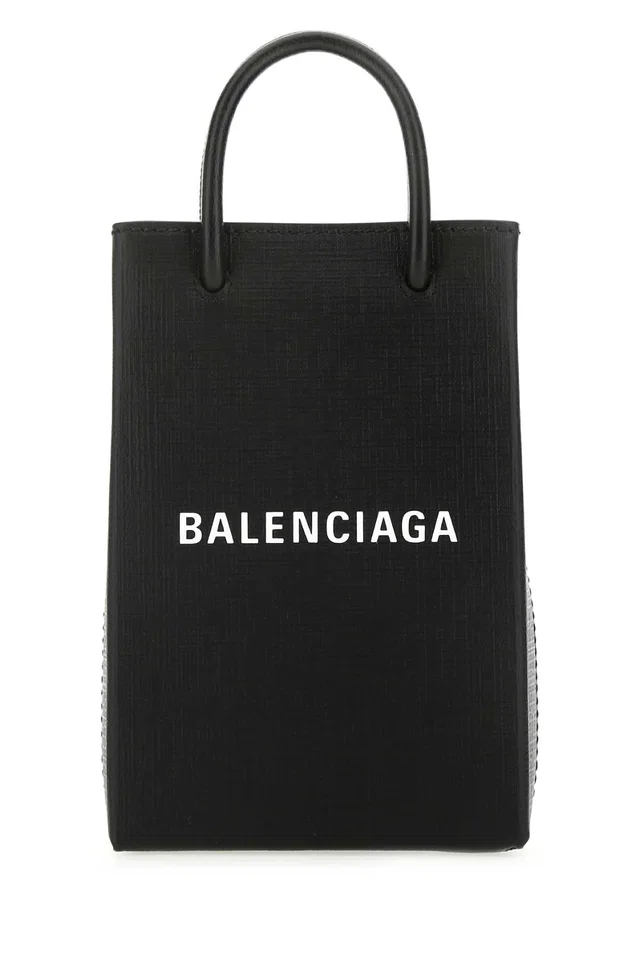 Balenciaga Logo-Embossed Calf Leather Phone Case Clutch — Black in Black Calfskin from HEWI
