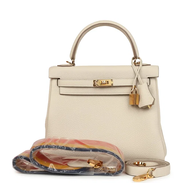 Hermès Kelly Retourne 25 Craie Togo Gold Hardware in White Togo leather from Madison Avenue Couture