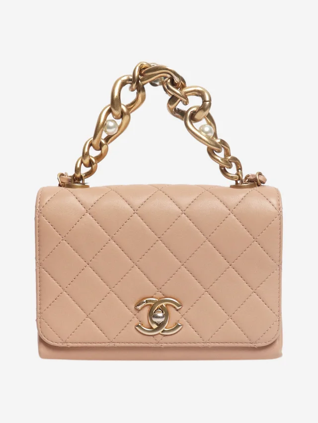 Chanel Dusty pink pearl chain mini flap bag in Pink Leather from Sign of the Times