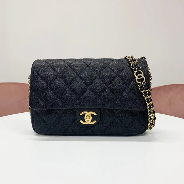 Chanel Quilted Turnlock CC Logo Double Chain Shoulder Bag in Caviar leather from The Reluxe