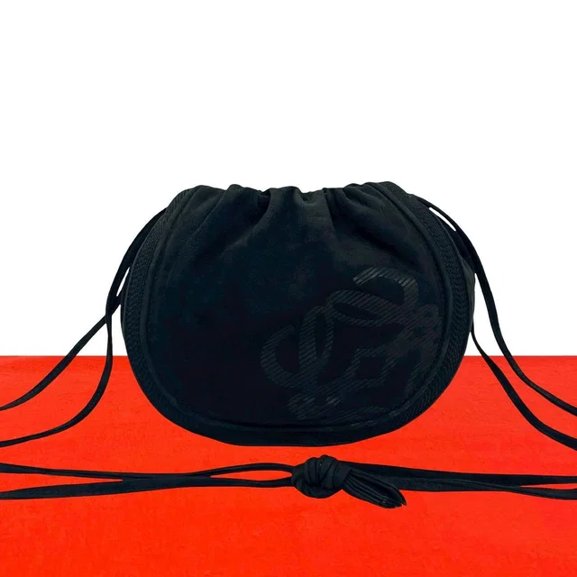 Loewe Vintage Anagram Logo Leather Shoulder Bag Drawstring Crossbody Pochette in Leather from The Reluxe