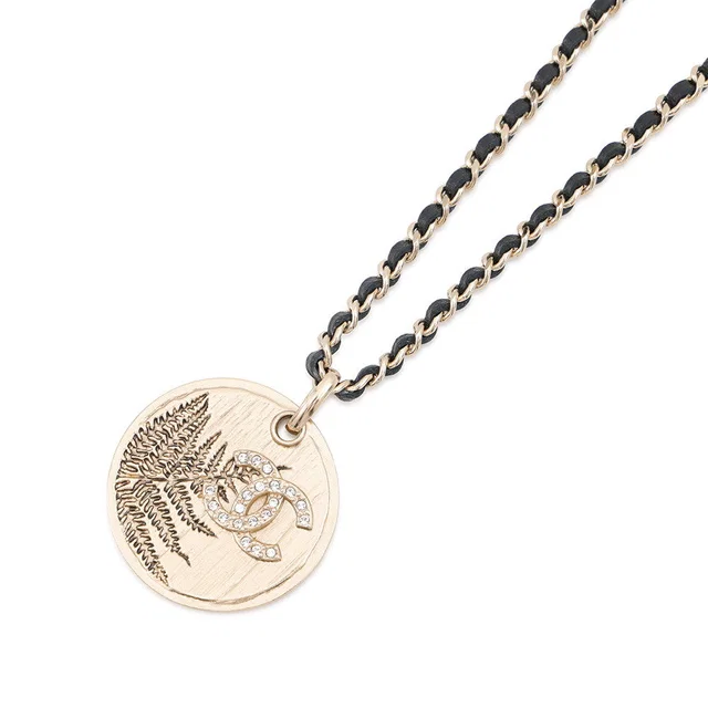 Chanel CC Logo Rhinestone Round Coin Necklace Champagne Gold Metal Rhinestone in Gold from GALLERY RARE