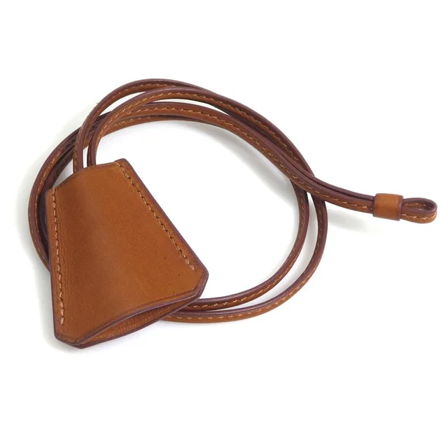 Hermès Clochette Necklace Brown in Brown Leather from The Reluxe