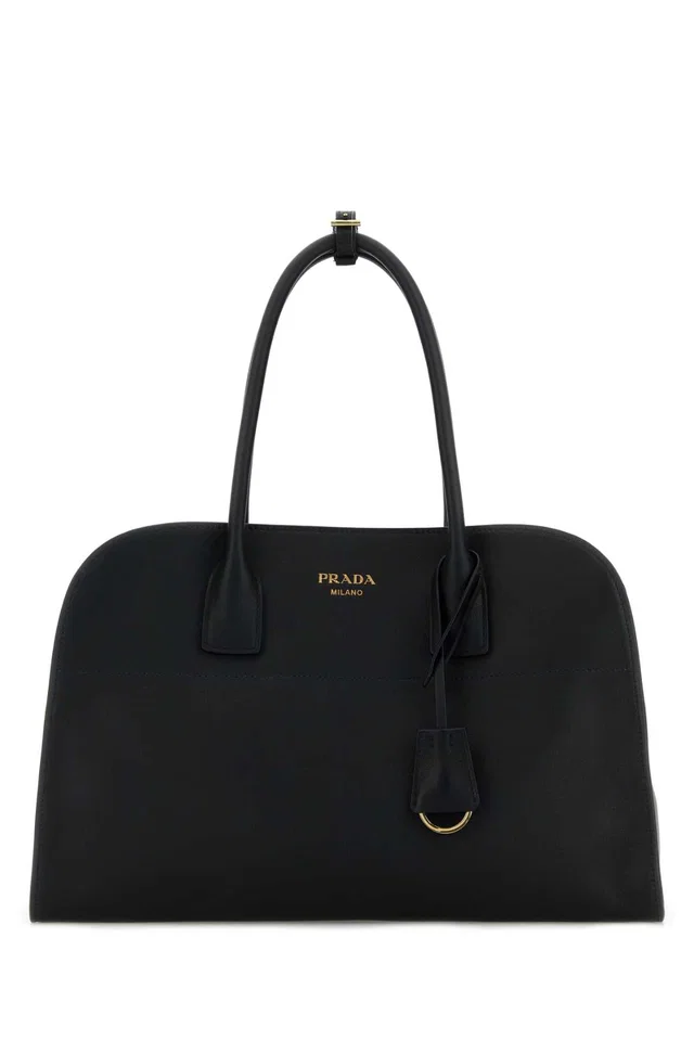 Prada Vitello Leather Shoulder Bag — Black in Black Leather from HEWI