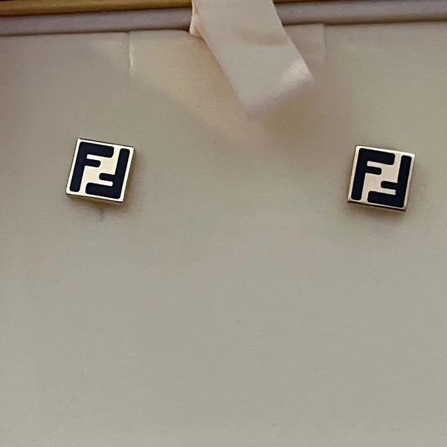 Fendi Black And Gold Square Studs in black|gold from Poshmark, photo 1 of 1