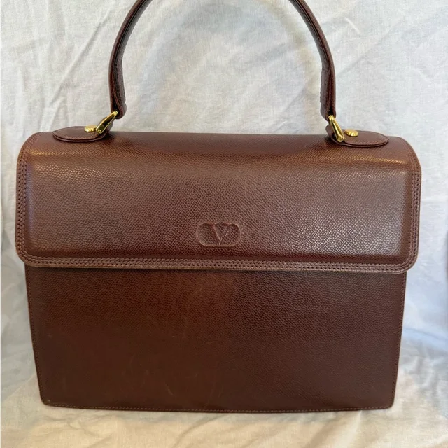Valentino Garavani Brown Leather Top Handle Handbag W/ Tassel Detail Vintage in brown|red Leather from Poshmark, photo 1 of 1