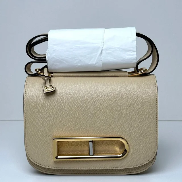 Delvaux Ringo Shoulder Bag Beige in Brown in brown|red from Grailed, photo 1 of 1