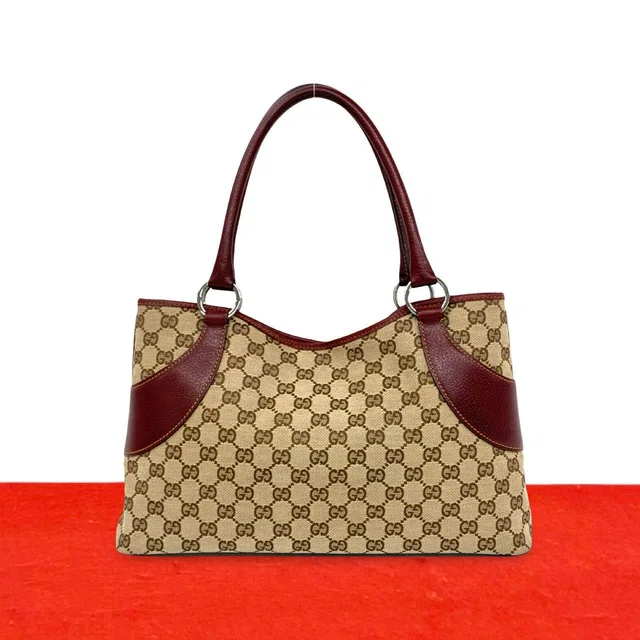 Gucci GG Logo Pattern Canvas Leather Tote Shoulder Bag Brown in Brown Canvas from The Reluxe