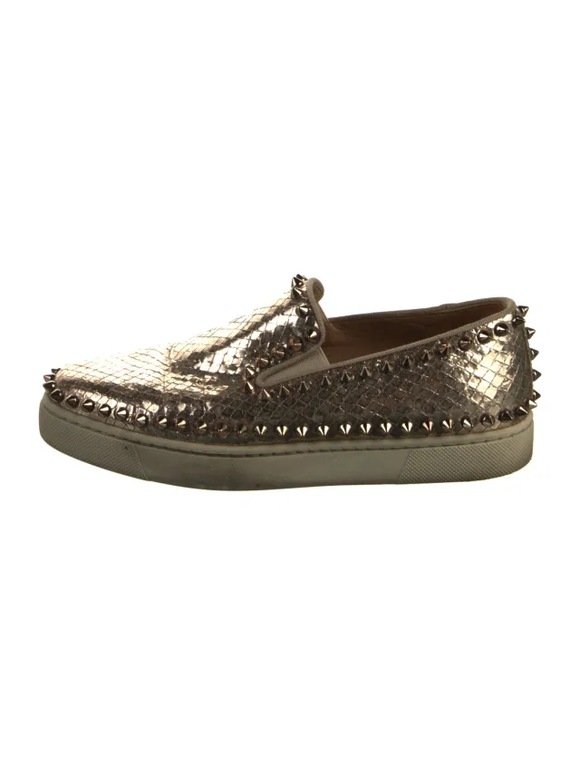 Christian Louboutin Spike Accents Embossed Leather Sneakers in gold Leather from The RealReal