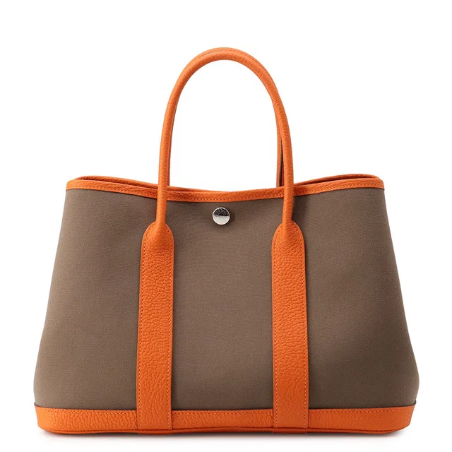 Hermès Garden Party Etoupe/Orange Toile Officier Negonda Leather Size TPM in Taupe Leather from GALLERY RARE