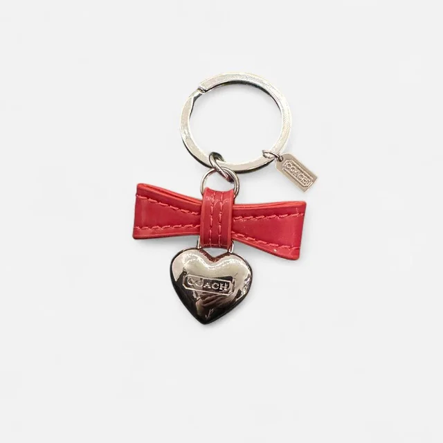 Coach Women's Necklace - Silver/Red in silver|gray|red from Depop