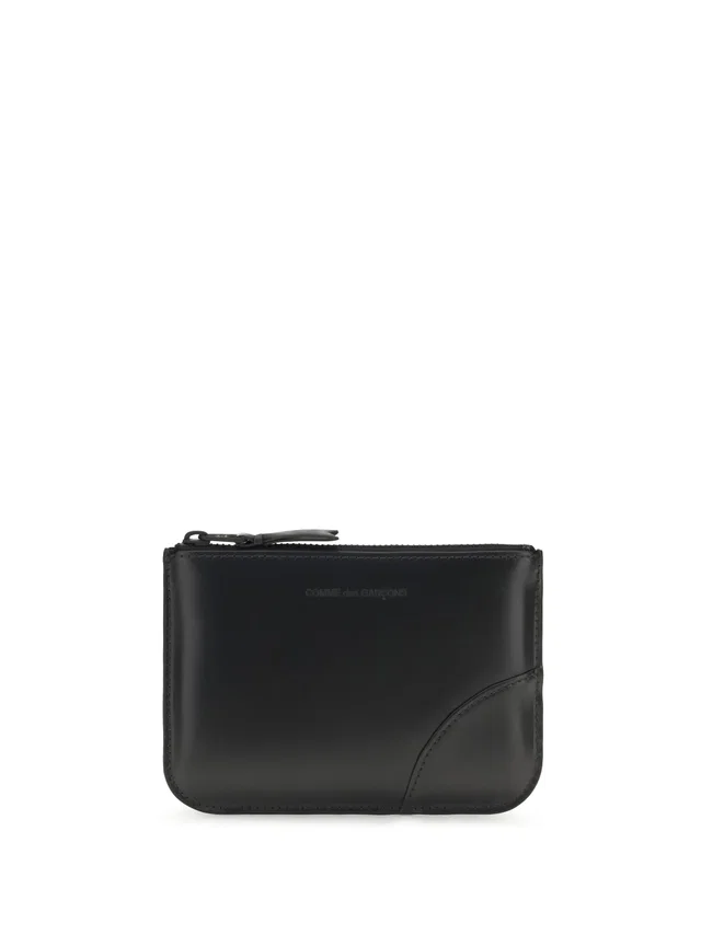 Comme des Garçons Embossed Logo Calf Leather — Black Bos Taurus in Black Calfskin from HEWI