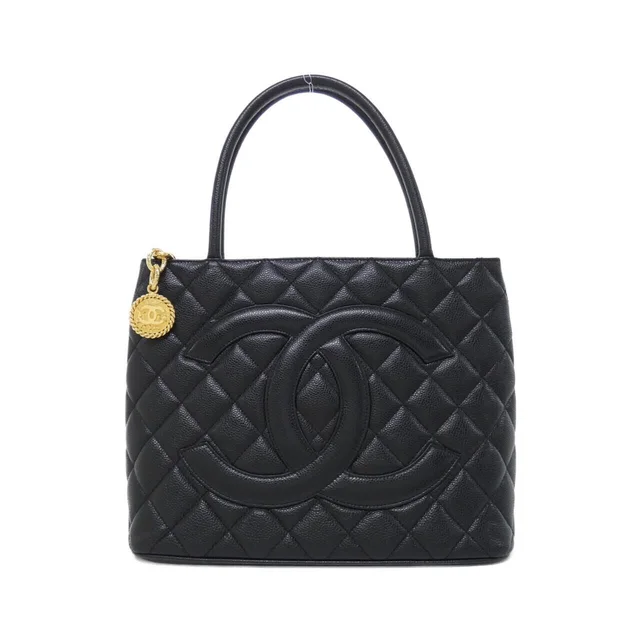 Chanel Bag Handbag Black in Black Caviar leather from The Reluxe
