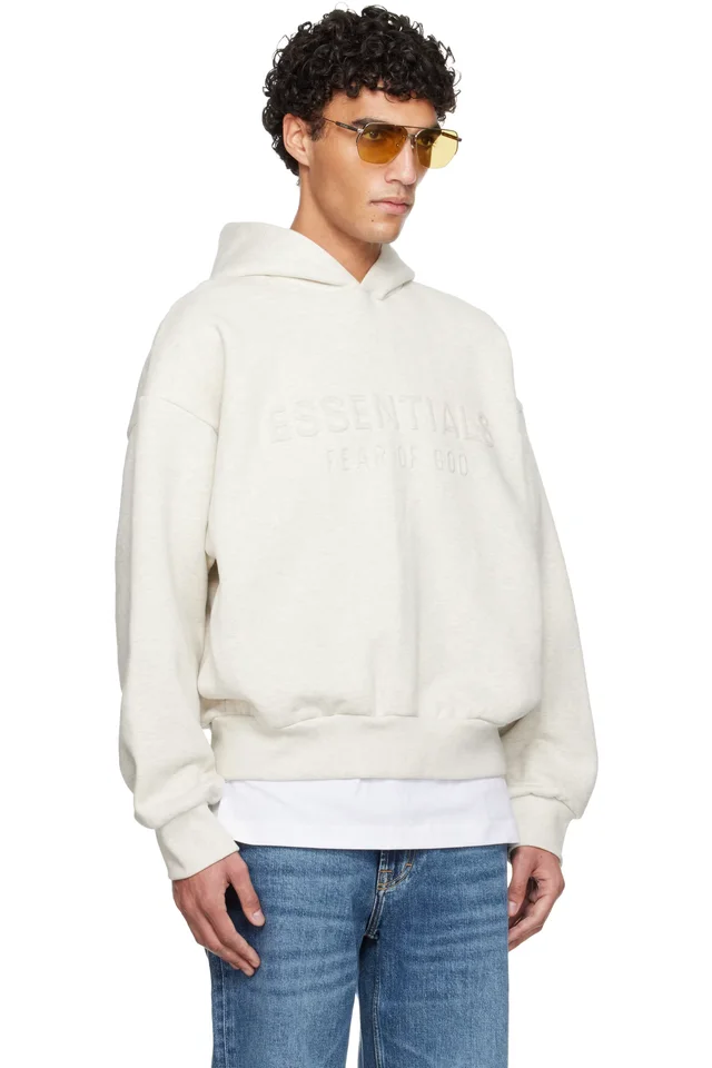 Fear of God ESSENTIALS Off-White Holiday Embossed 'Essentials' Classic Hoodie, photo 2 of 2 from SSENSE