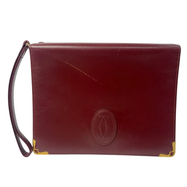 Cartier Must Clutch Burgundy in Burgundy Leather from The Reluxe