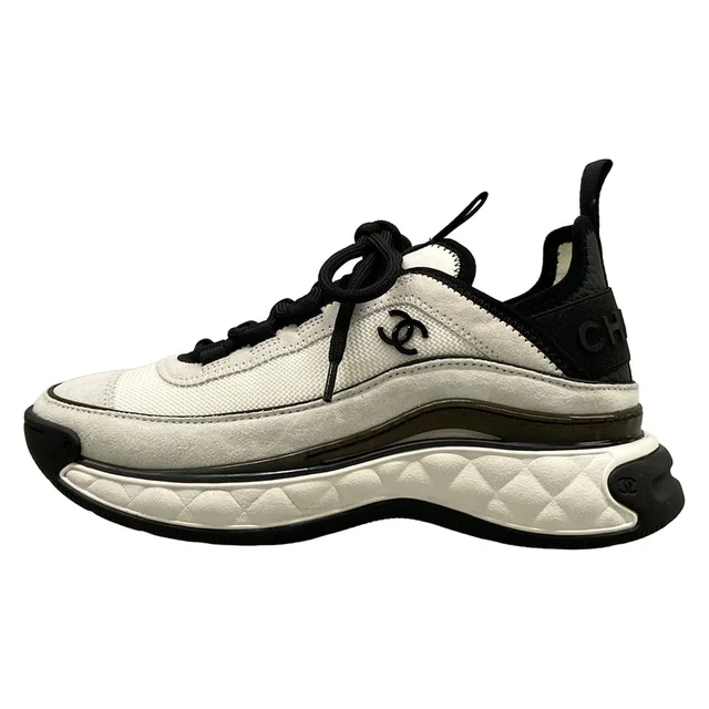 Chanel Sneakers White Black in Black Suede from The Reluxe