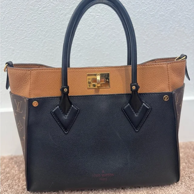Louis Vuitton On My Side Mm in black|brown|red from Poshmark, photo 1 of 1