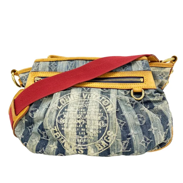 Louis Vuitton Shoulder Bag Monogram Denim Portier MM Blue in Blue Denim from The Reluxe